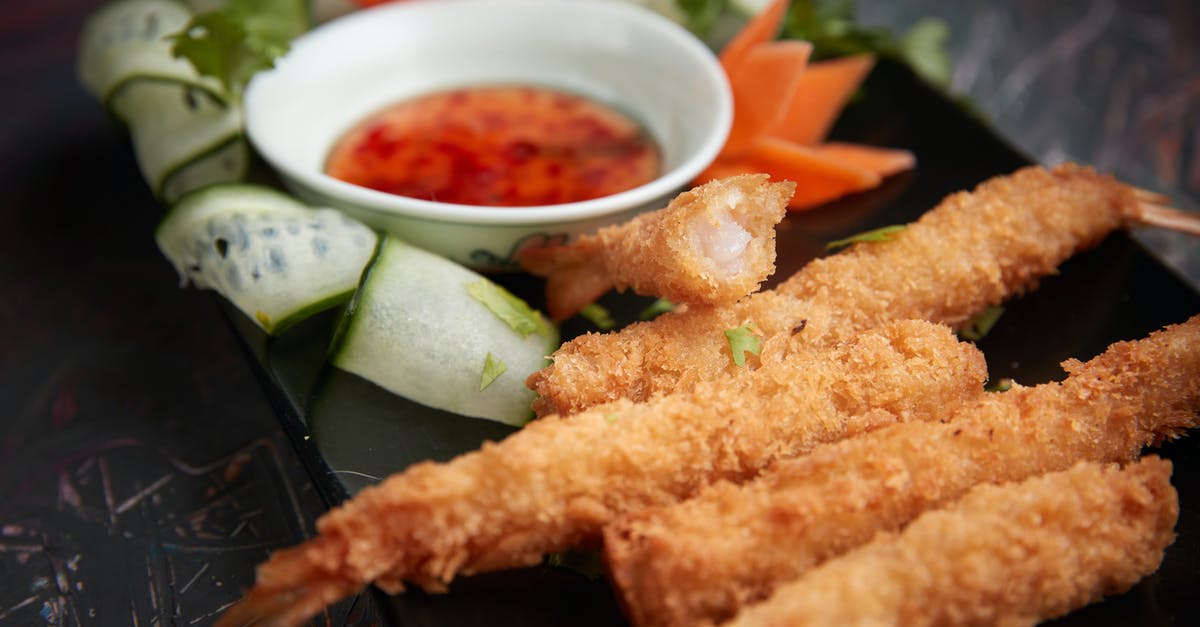 Is panko just pretentious breadcrumbs? - Deep Fried Breaded Shrimps on a Black Plate
