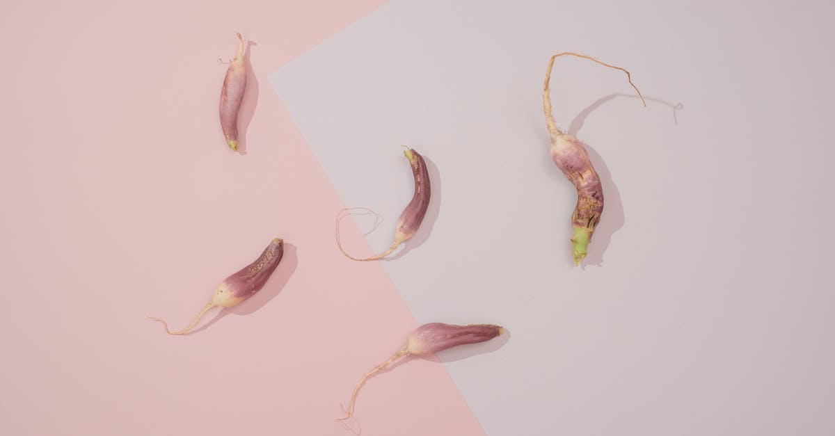 Is parsley root with pink spots safe to eat? - Five Radish on Pink Background