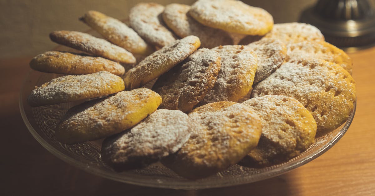 Is sugar necessary for the texture of homemade sherbet? - From above of delicious sweet baked cookies served on plate on wooden table