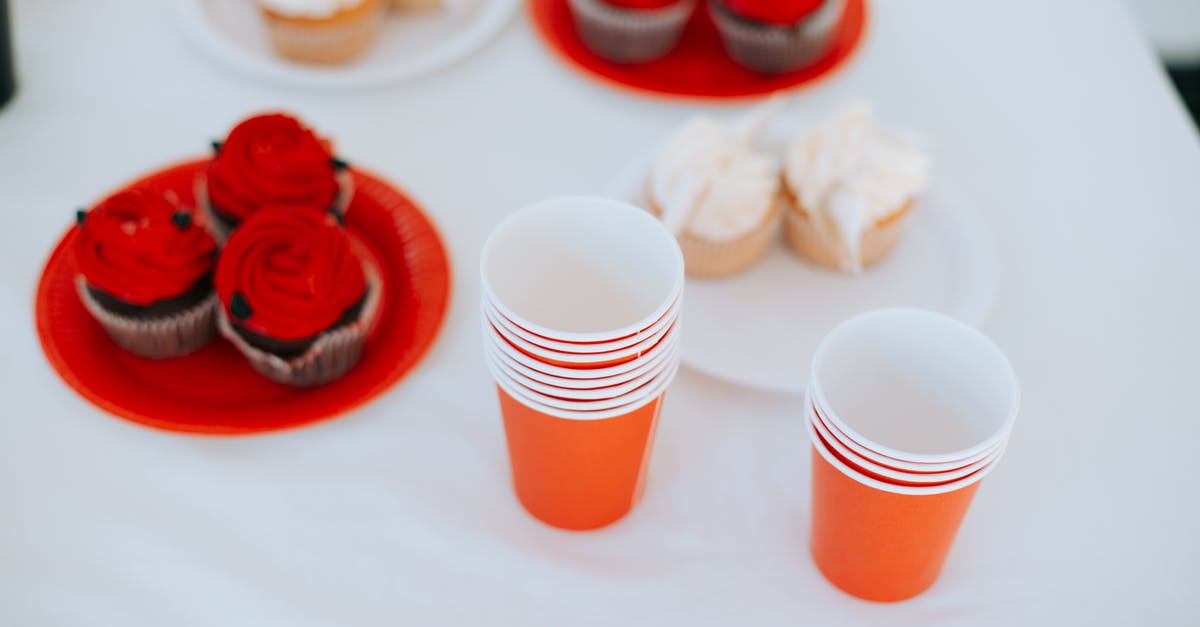 is there a blender/food processor combo still made? - Red and White Disposable Cups on White Table