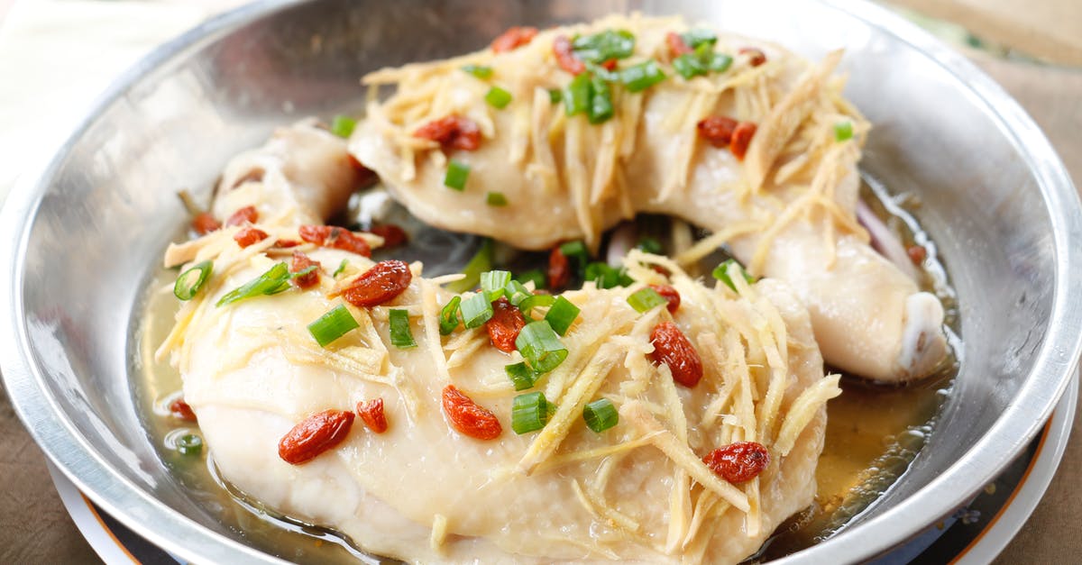 Is there a difference between poached and steamed chicken? - Steamed Chicken on Stainless Bowl