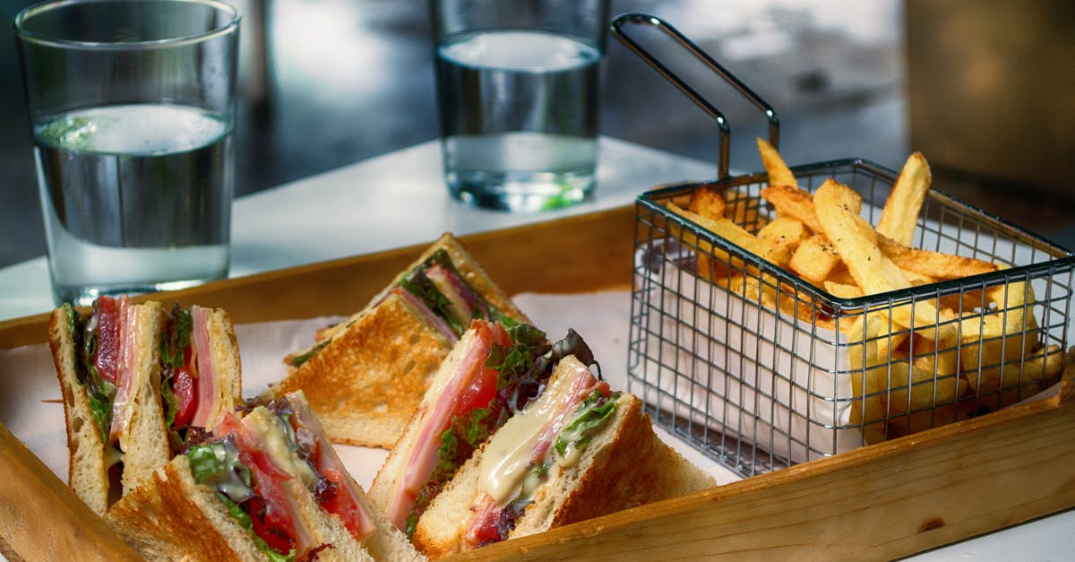 Is there a name for this French Toast variation? - Fried Food on Wooden Tray