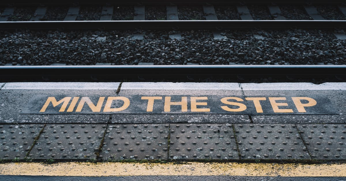 Is there a way to properly steel-cut oats yourself? - Platform with inscription near railway on city street