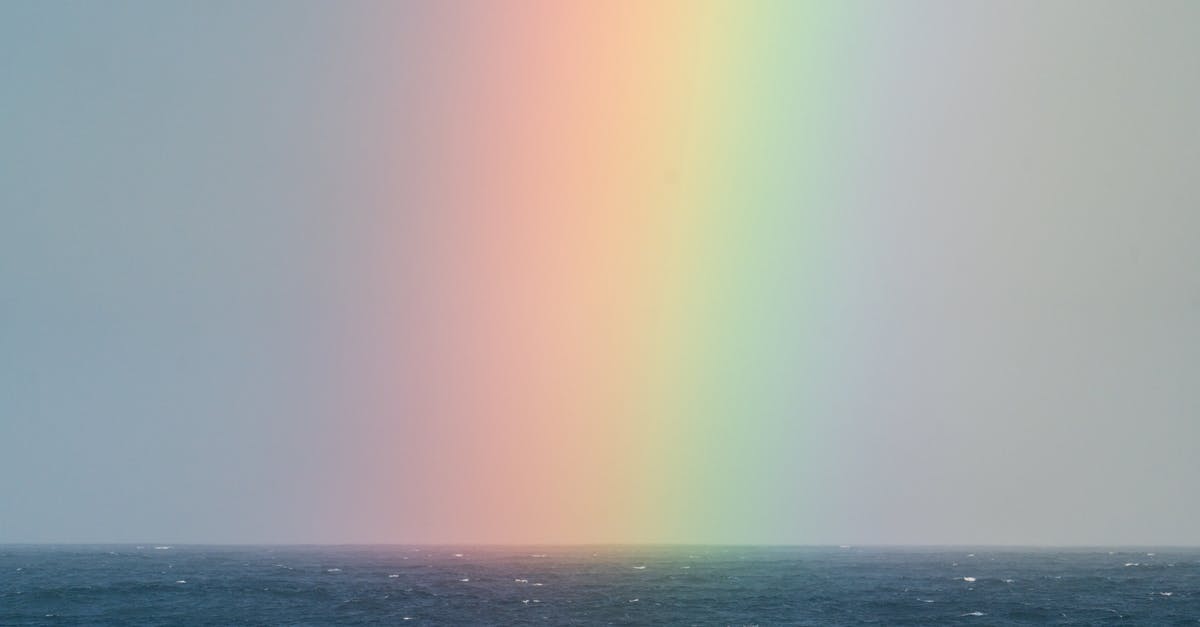 Is there something special about bubbly water? - Rainbow on sky over sea