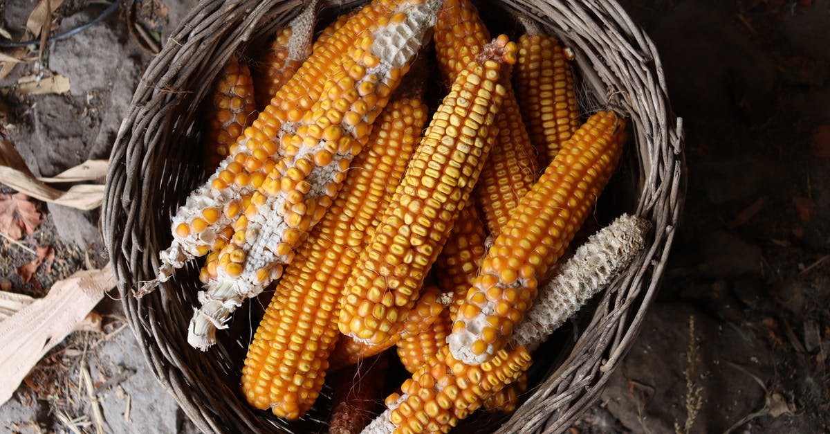 Is there something wrong with the corn kernels that don't pop? -  Yellow Corns Inside a Woven Basket