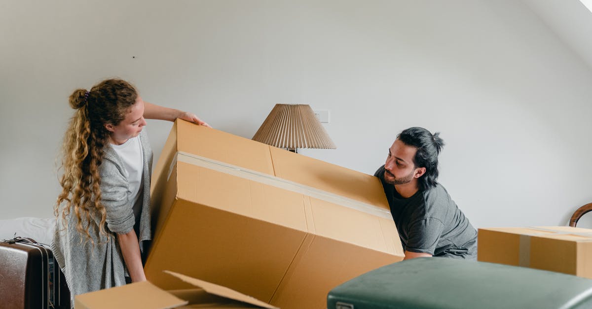 Is there such a thing as pumpernickel flour? - Man and woman carrying carton box