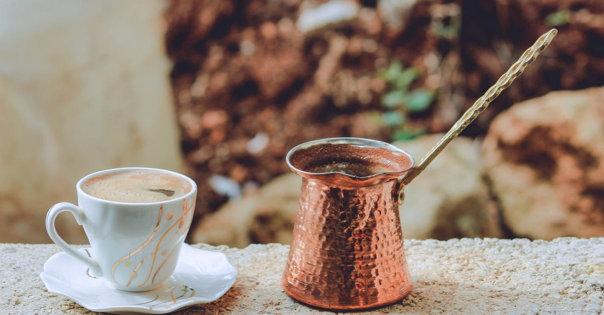 Is Turkish coffee grinding finer than Espresso grinding? - White Tea Cup on Gray Surface