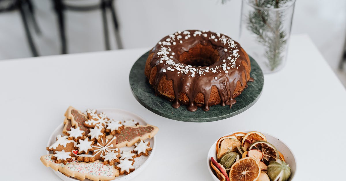 Is using chocolate instead of royal icing for a gingerbread house more difficult? - Chocolate Doughnut on White Ceramic Plate