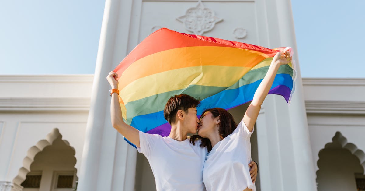 Is white rice bleached before being processed? - Two Lesbian Girls Kissing Each Other and Carrying Rainbow Flag