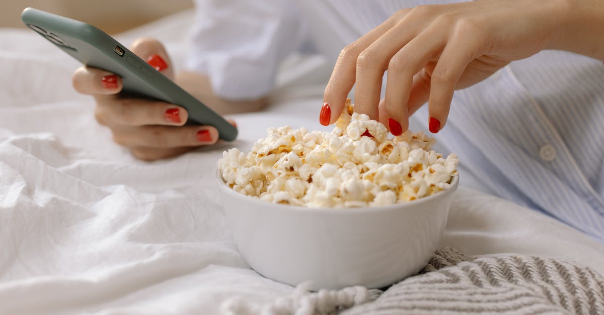 Jaw Shattering popcorn - White Ceramic Bowl With Popcorn