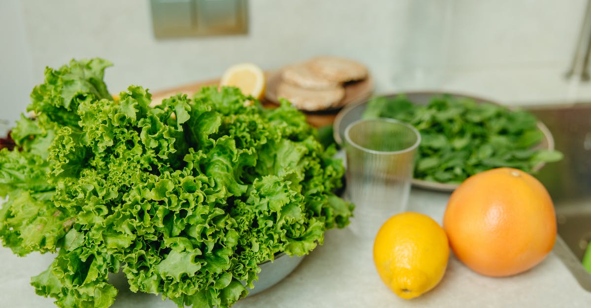 Kale vs Spinach in Zuppa Toscana lasting - Green Vegetable on White Table