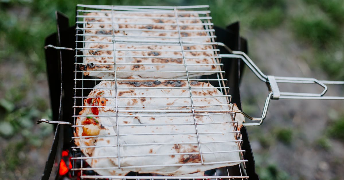 Keep chicken with skin from catching on fire on the barbeque - Process of grilling meat and vegetables in lavash