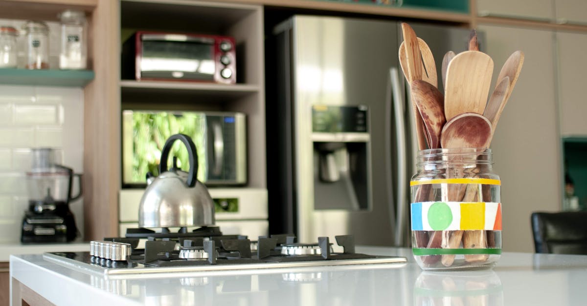 Keeping an aluminium dish in a convection microwave - Cozy kitchen with wooden utensil at home