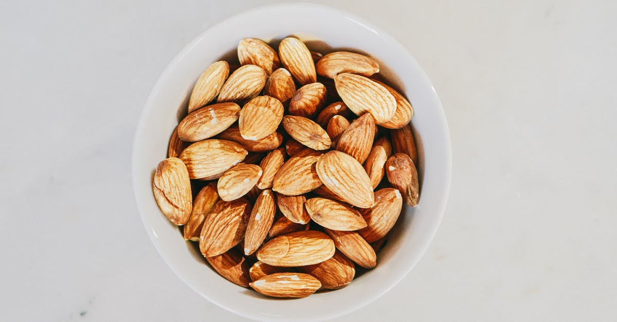 Keeping meat dry after salting it - Brown Almond Nuts on White Ceramic Bowl