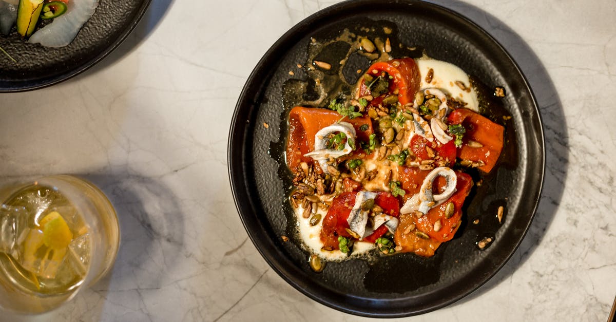 Keeping steaks hot after cooking in a cast-iron pan - Plate of Food With Salsa