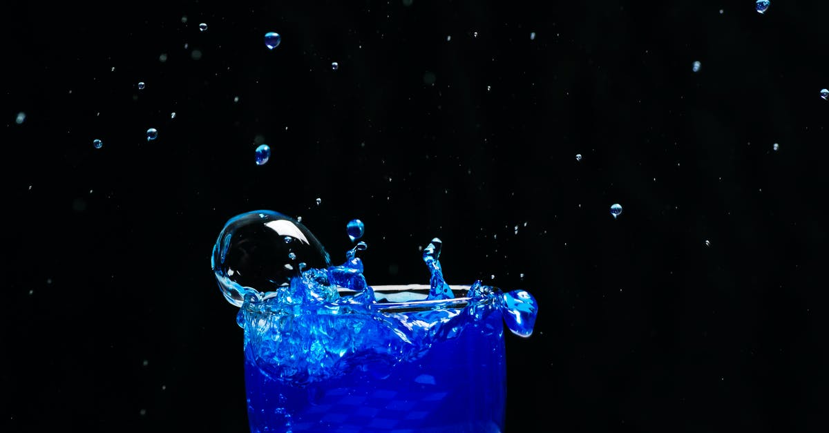 Keeping the bubbles in sparkling gelatin desserts - Blue Liquid Splash on Glass