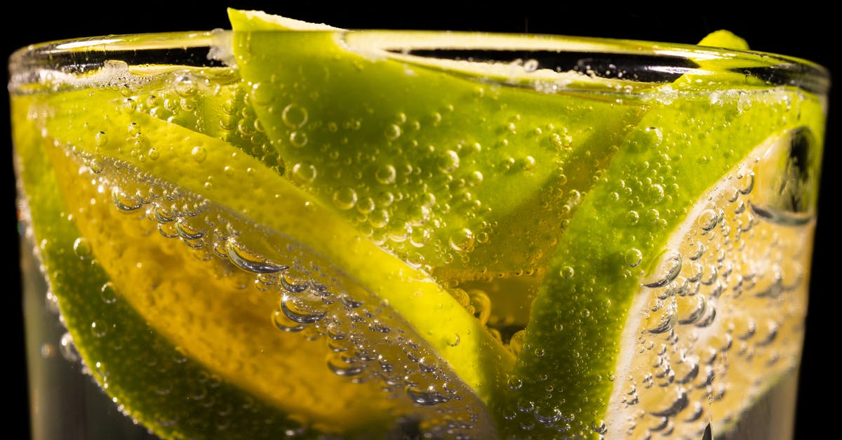 Keeping the bubbles in sparkling gelatin desserts - Sliced Lime in Clear Drinking Glass