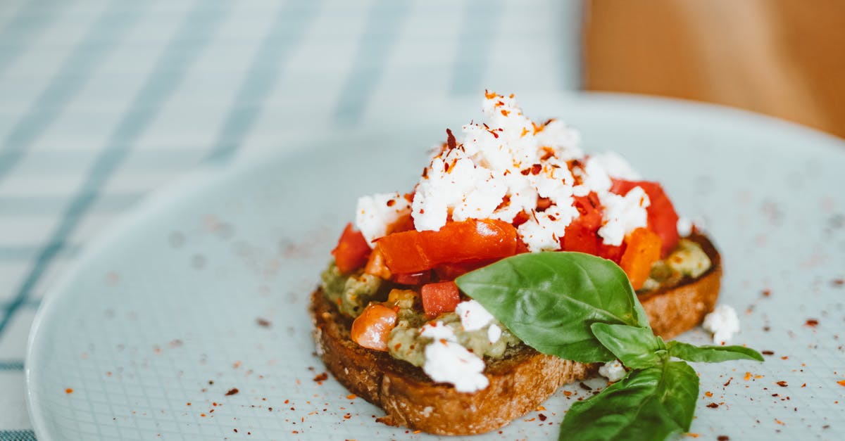 Keto King Bread Rise Problem - Brown Bread With White Rice and Green Leaf on White and Blue Checkered Table Cloth