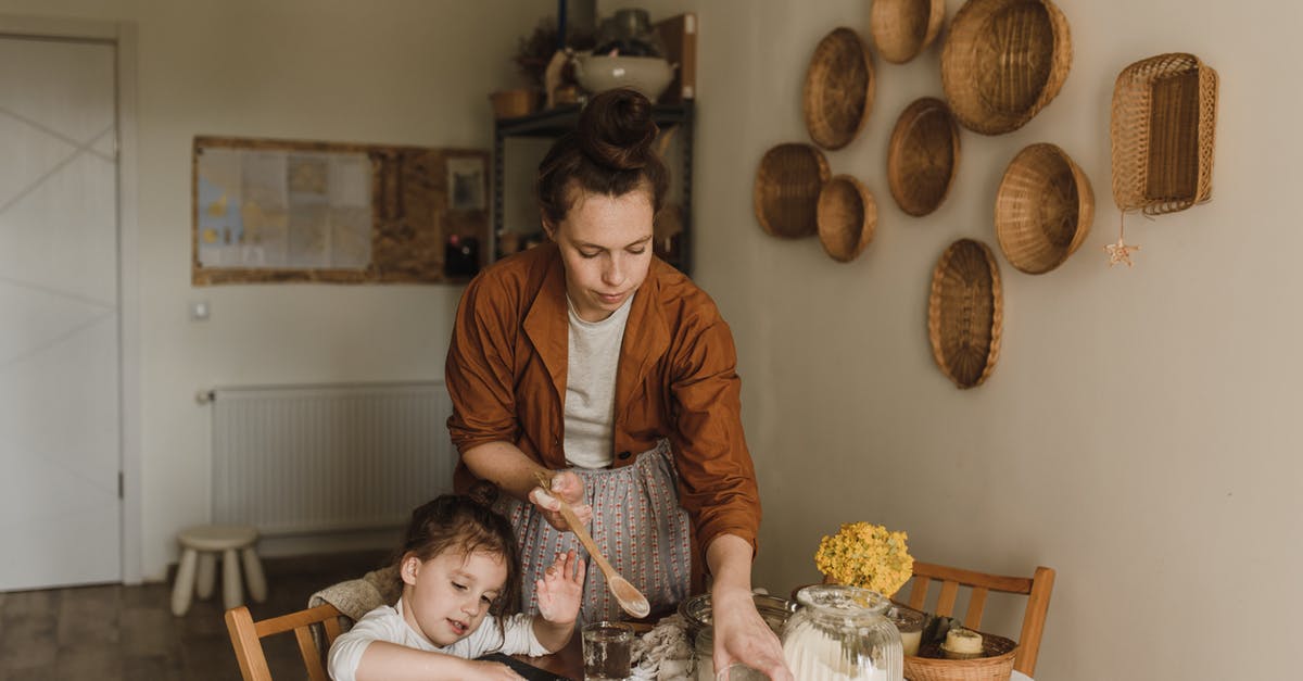 Kneading causing gluten - Man in White Dress Shirt Sitting Beside Girl in White Long Sleeve Shirt