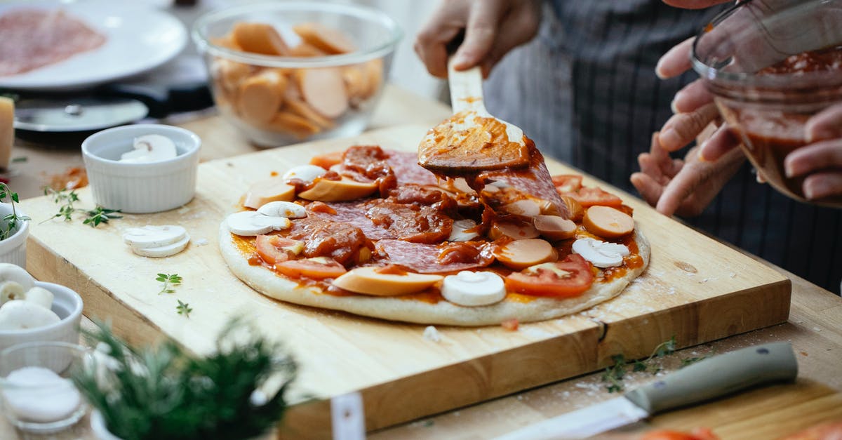 Knife to Cut Dough - Crop people adding sauce on pizza