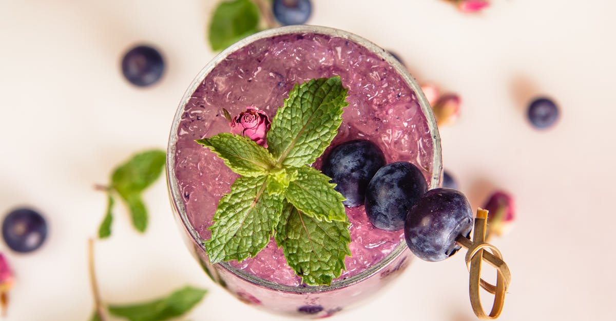 lactofermenting blueberries have hardly produced any liquid - is this safe? - Close-Up Photo Of Blue Berry Drink