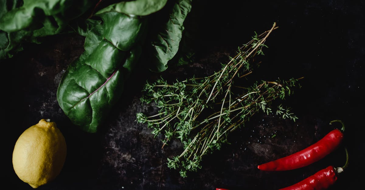 Lemon Thyme Substitute - Overhead Shot of Ingredients on a Black Surface