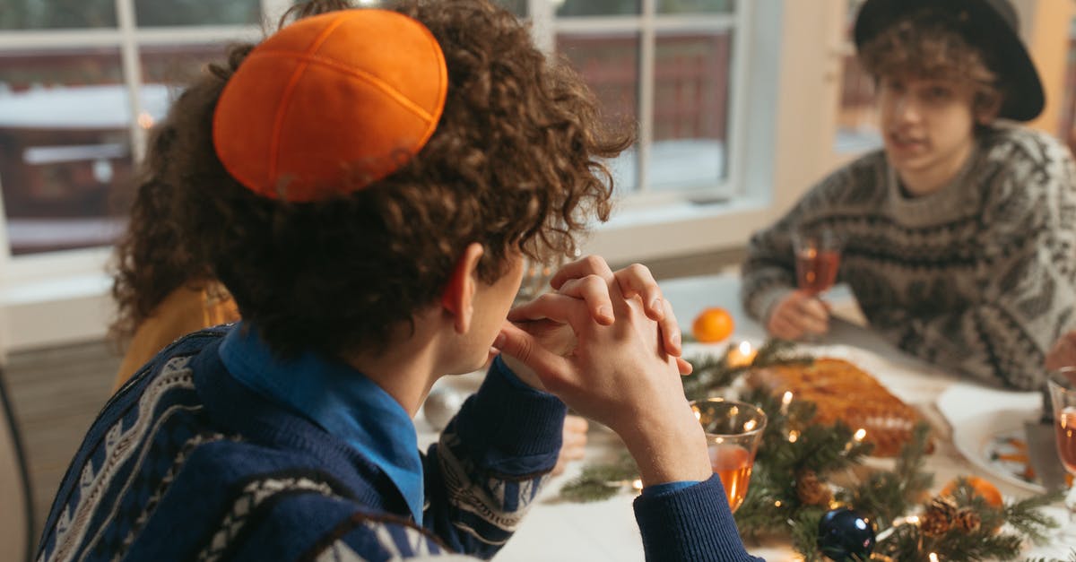 Letting wine reduce before braising - Man in Black Jacket Holding Orange Basketball