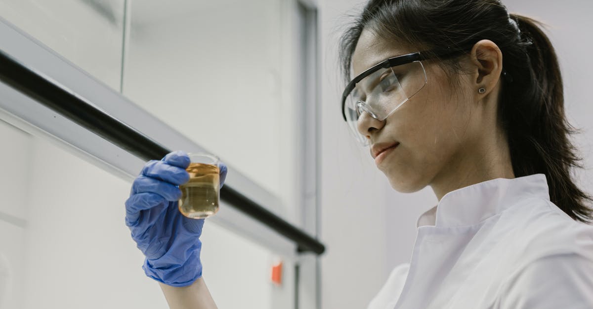 Liquid sloshing around in vacuum-packed mussels? - Woman in White Collared Shirt Wearing Eyeglasses