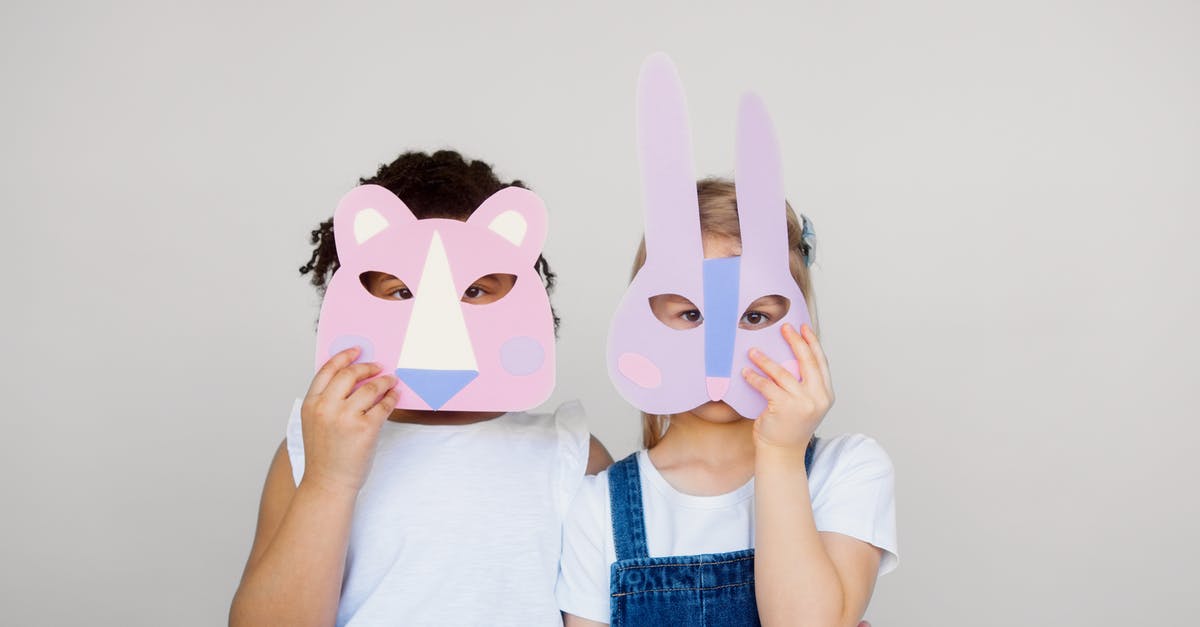 looking for an idea for "fondue alternative" dish, that can be served in a buffet - Two Kids Covering Their Faces With a Cutout Animal Mask
