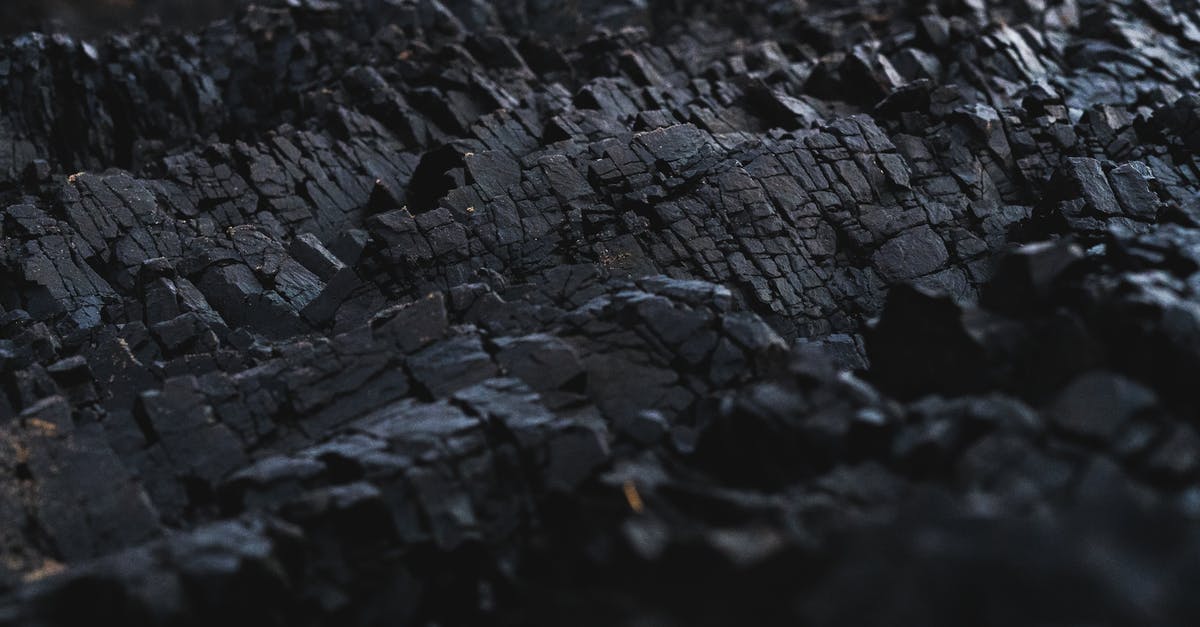 Lump Charcoal vs Briquettes and variations in brands - Rock Formation Close-up Photography