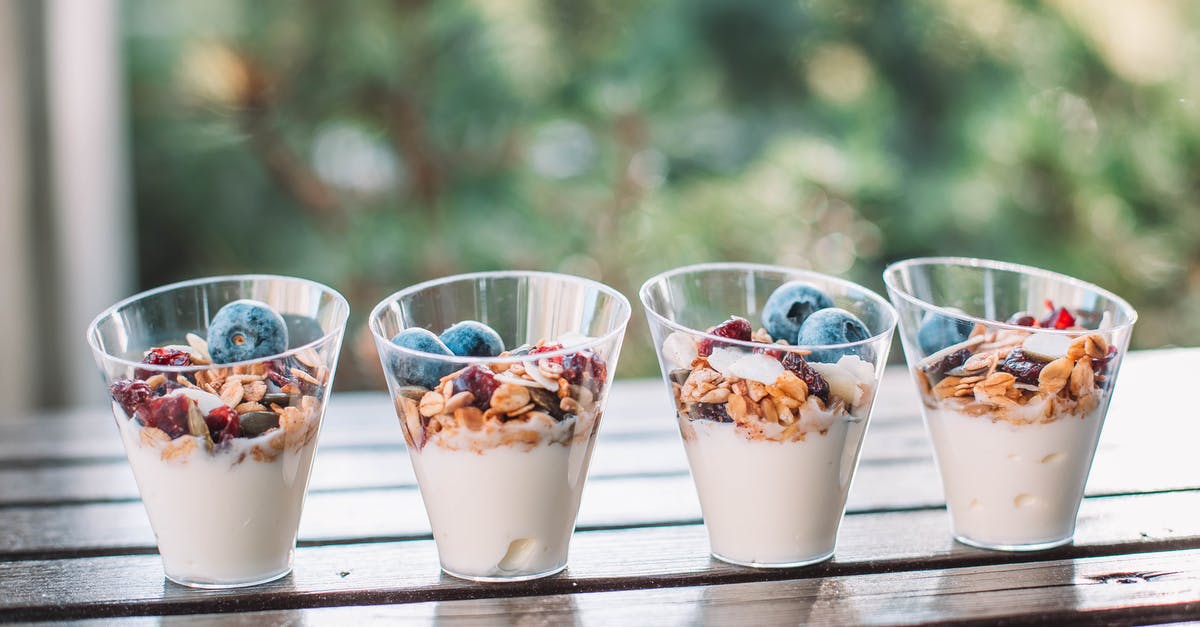 Making drinkable yogurt - Creamy Grains With Blueberries in Clear Cups
