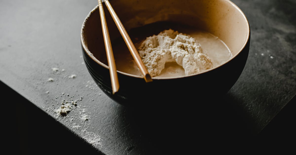 Making flour tortillas softer and more elastic - Close-Up Photograph of Wooden Chopsticks on a Bowl with Dough
