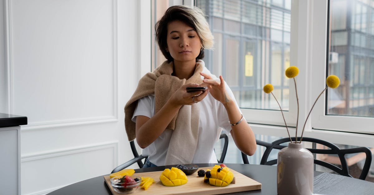 making iced tea with lowest caffeine content - Woman in White Shirt Sitting on Chair