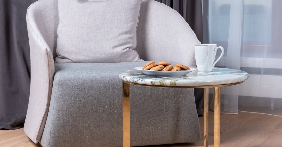 Making molasses cookies less soft - Plate of crunchy cookie and cup of coffee placed near armchair in living room