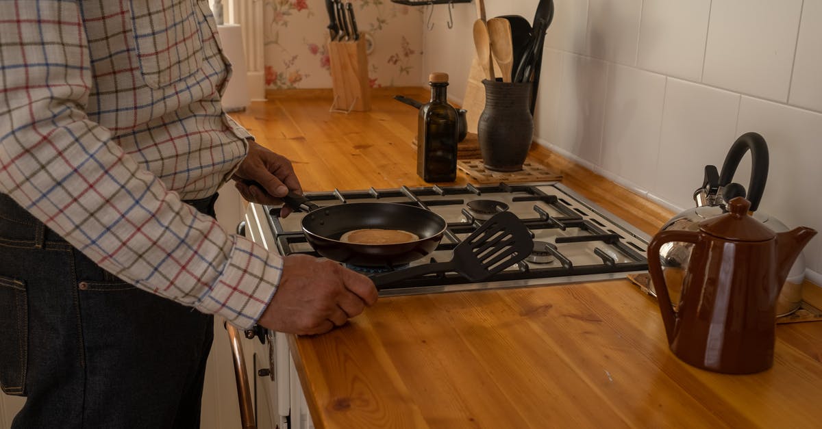 Making pearl couscous in slow cooker - Man in Checked Shirt Making Pancakes