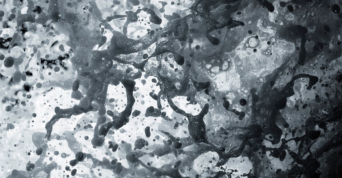 Making sourdough bread in a warm and humid climate - Black and white of foamy water of powerful wavy sea in bright daylight