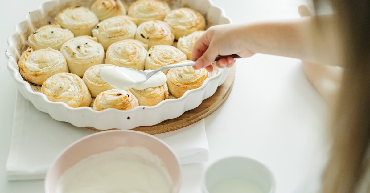 Making tea - milk first or tea first - Person Holding White Ceramic Bowl With White and Brown Pastry