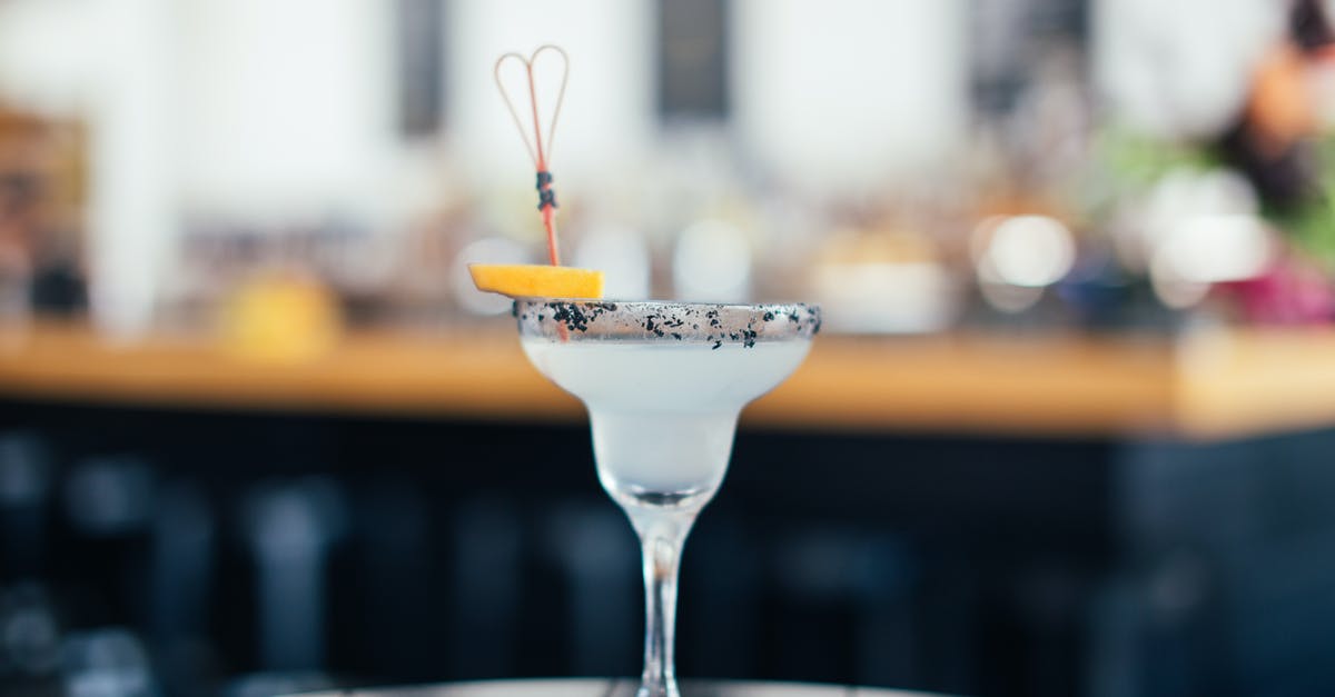 Making vinegar - alcohol and sugar tolerance - Glass of sweet cold alcoholic cocktail on table