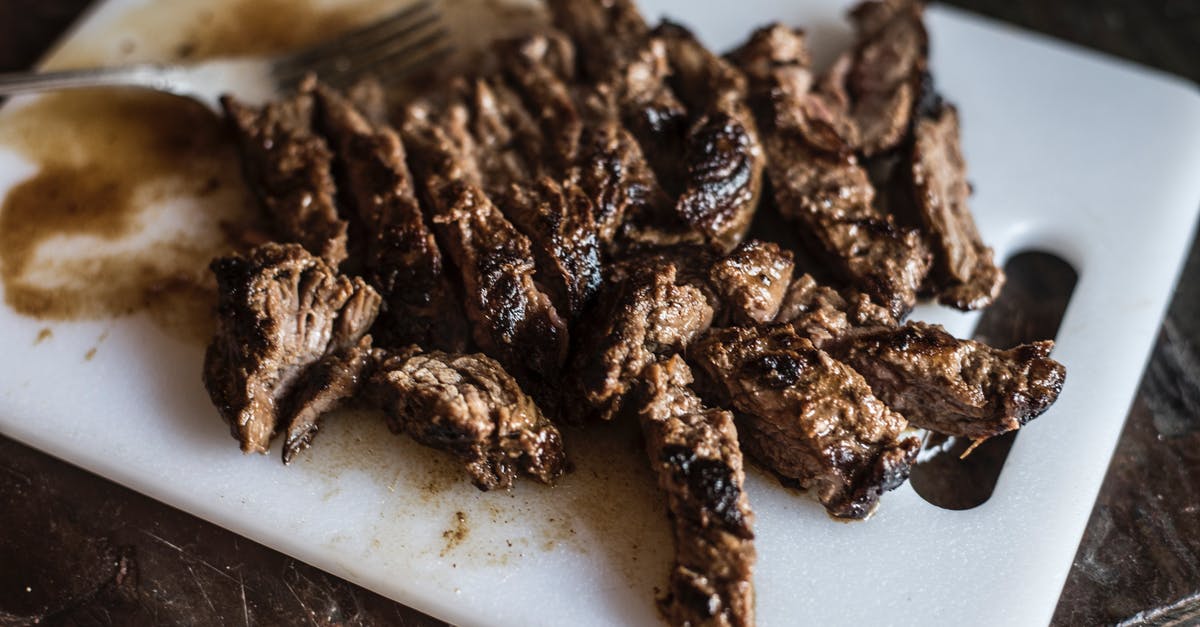 Marinate pork loin overnight? - Marinated Steak Bites on White Platter in Close Up Photography