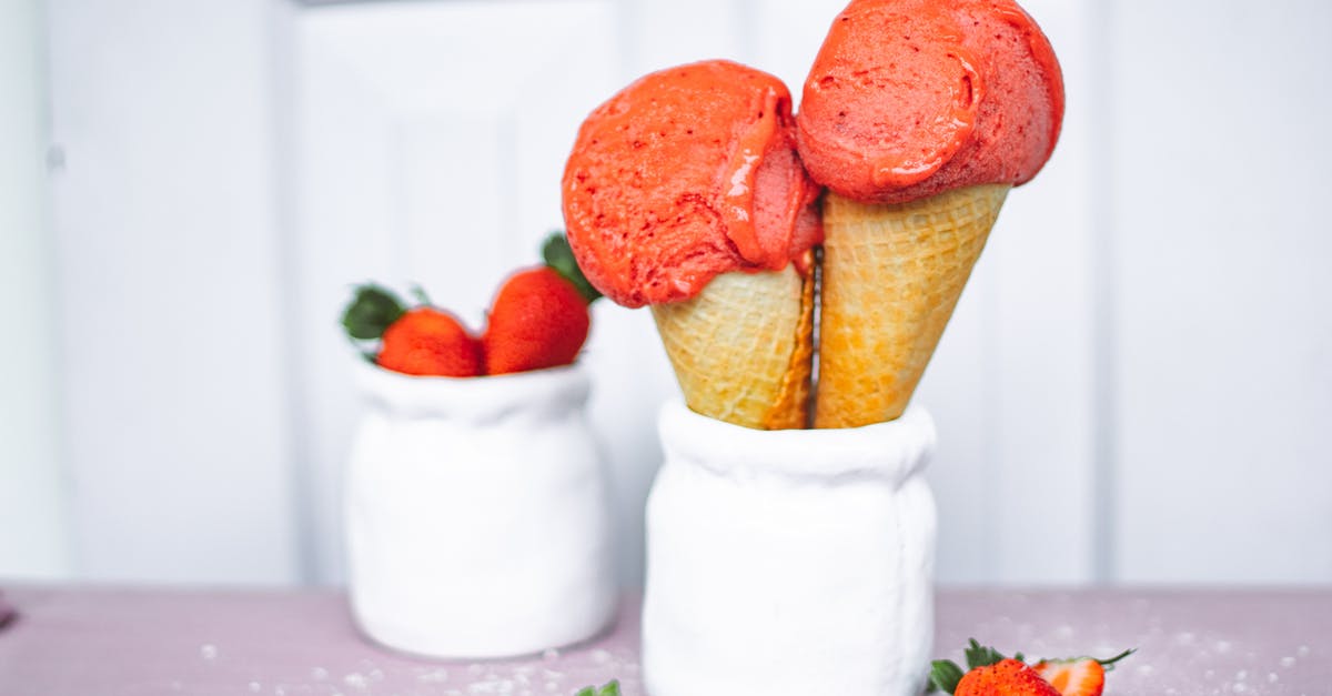 Marshmallow in cones becoming soggy - Cones of Strawberry Ice Cream in White Jar