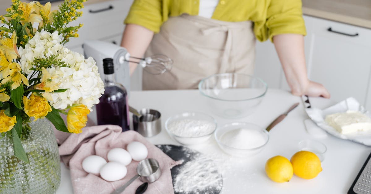 Mayonnaise in stand mixer is very runny - Crop woman with various ingredients