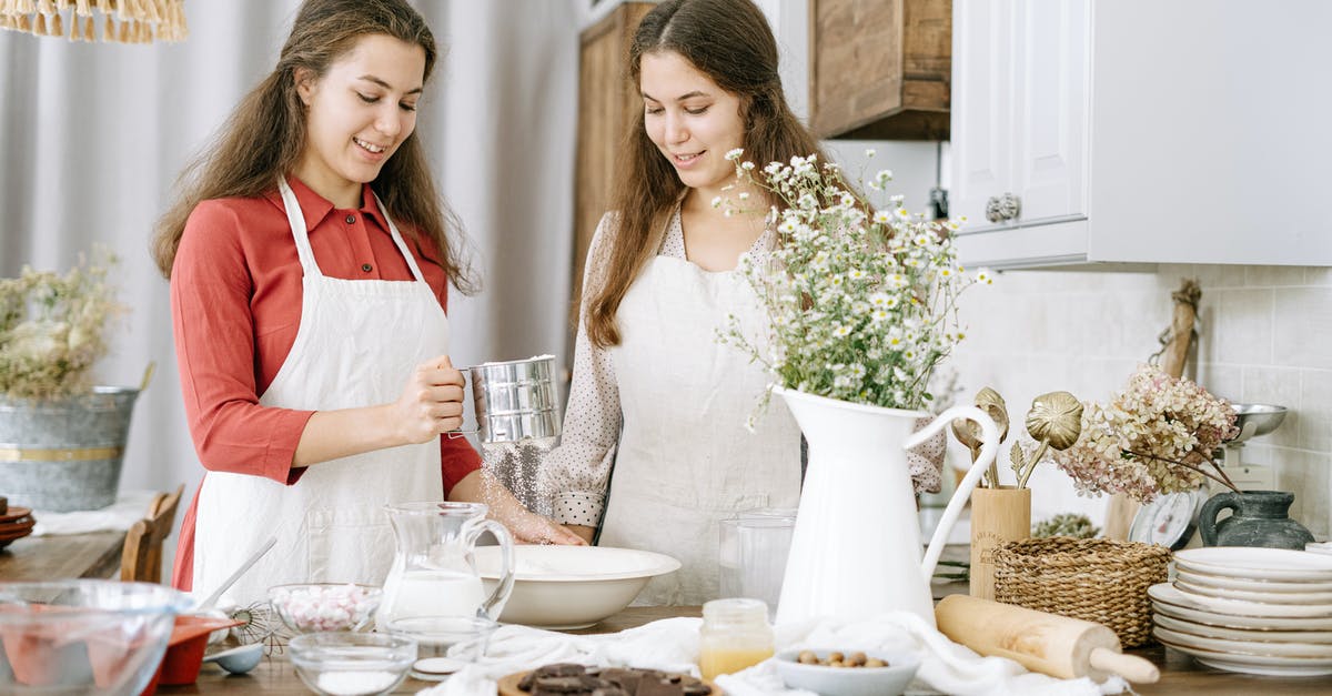 Meaning of 'sift together' - Women Standing at the Table