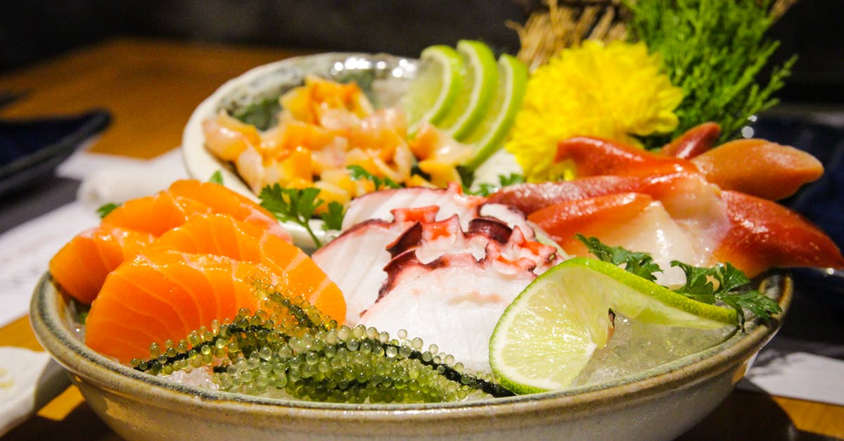 Mexican ceviche vs. Japanese sashimi - Served cold sashimi with herbs and condiments