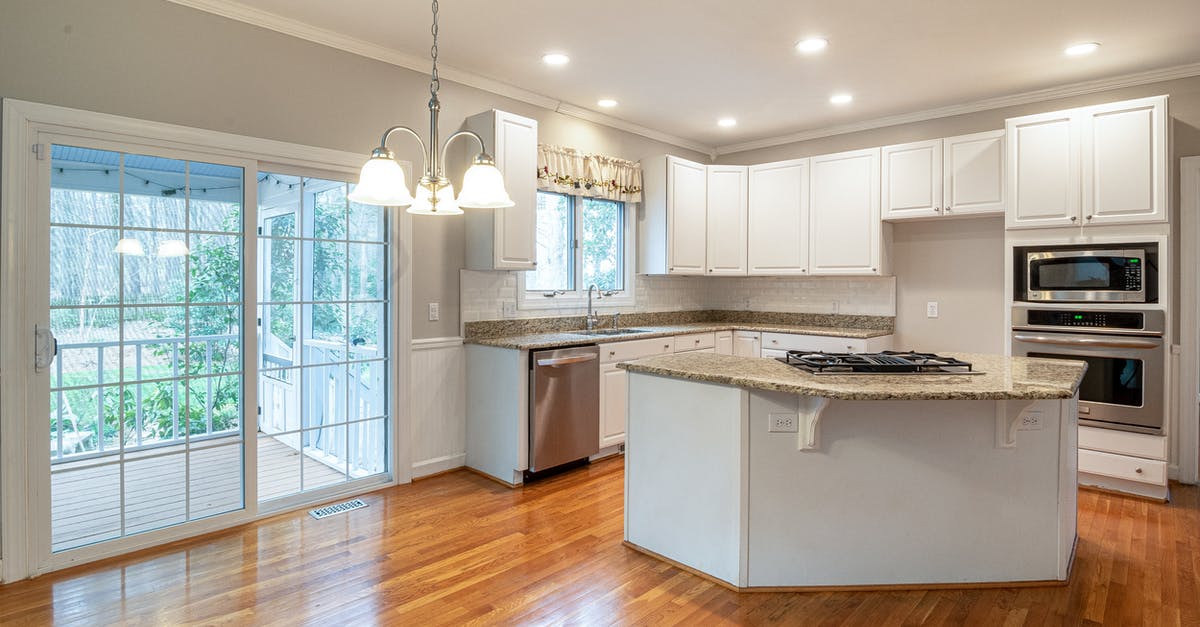 Microwave steaming - venting/holes optional? - White and Brown Kitchen Counter