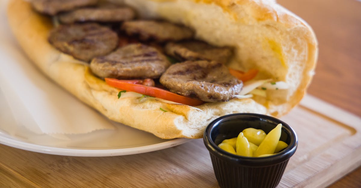 Minimalist Burger Patties [closed] - Burger Sandwich With Tomato on White Ceramic Plate