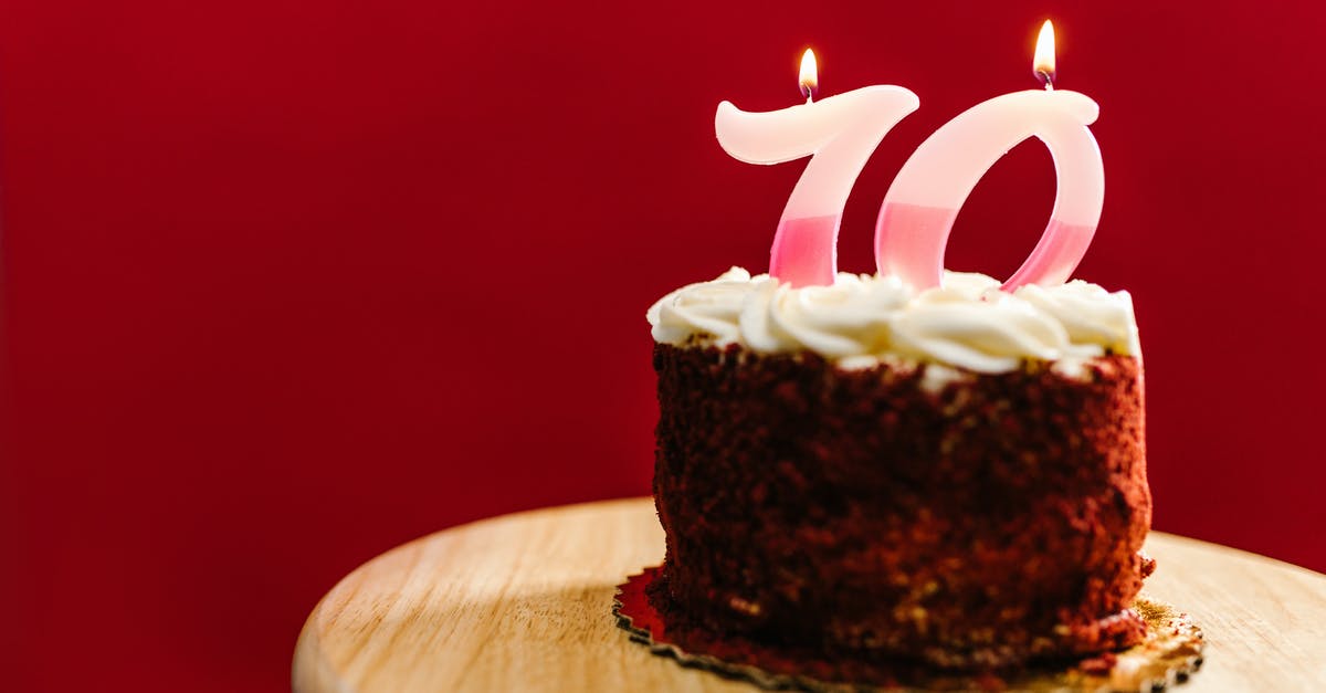 Mixing 60% and 81% dark chocolate to get 70% - Chocolate Cake With White and Pink Lighted Candles