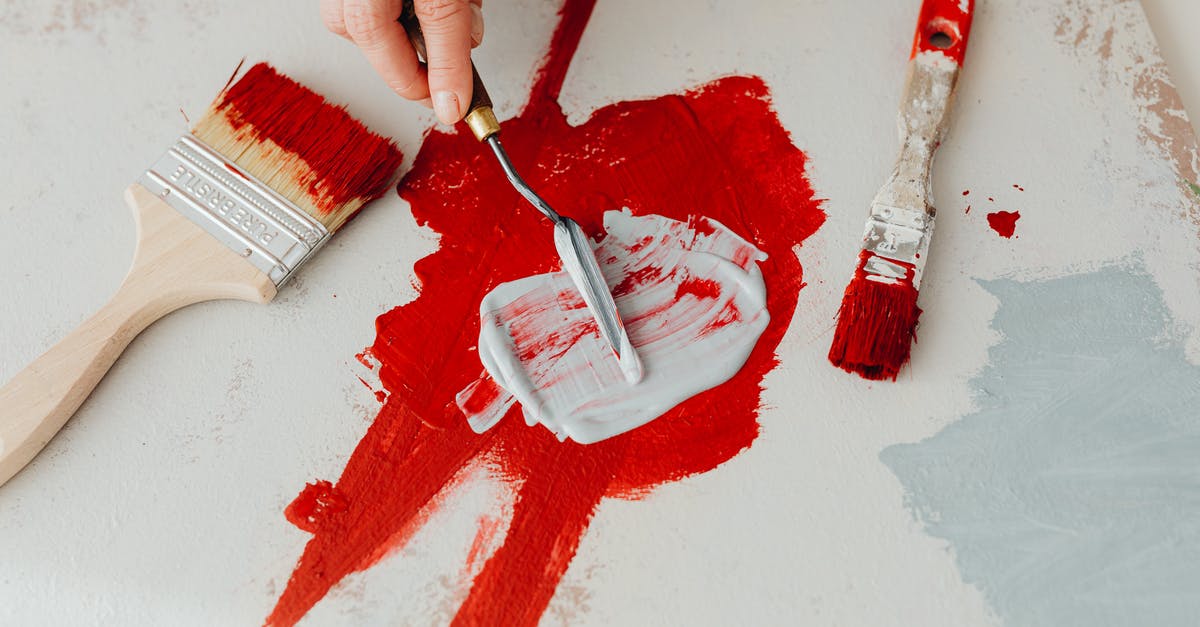 Mixing mozzarella without clumping - Person Holding Red Paint Brush