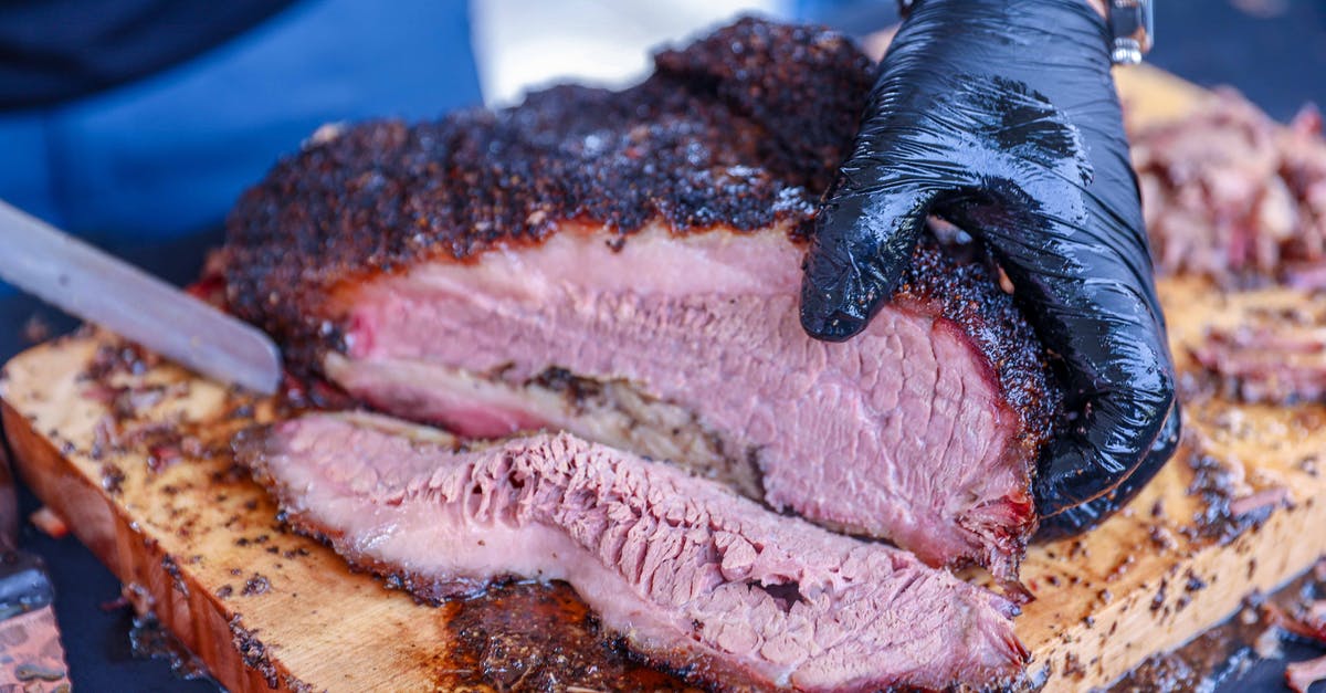 Modernist Cuisine-style BBQ brisket safety - A Person Slicing Barbecue Beef Brisket