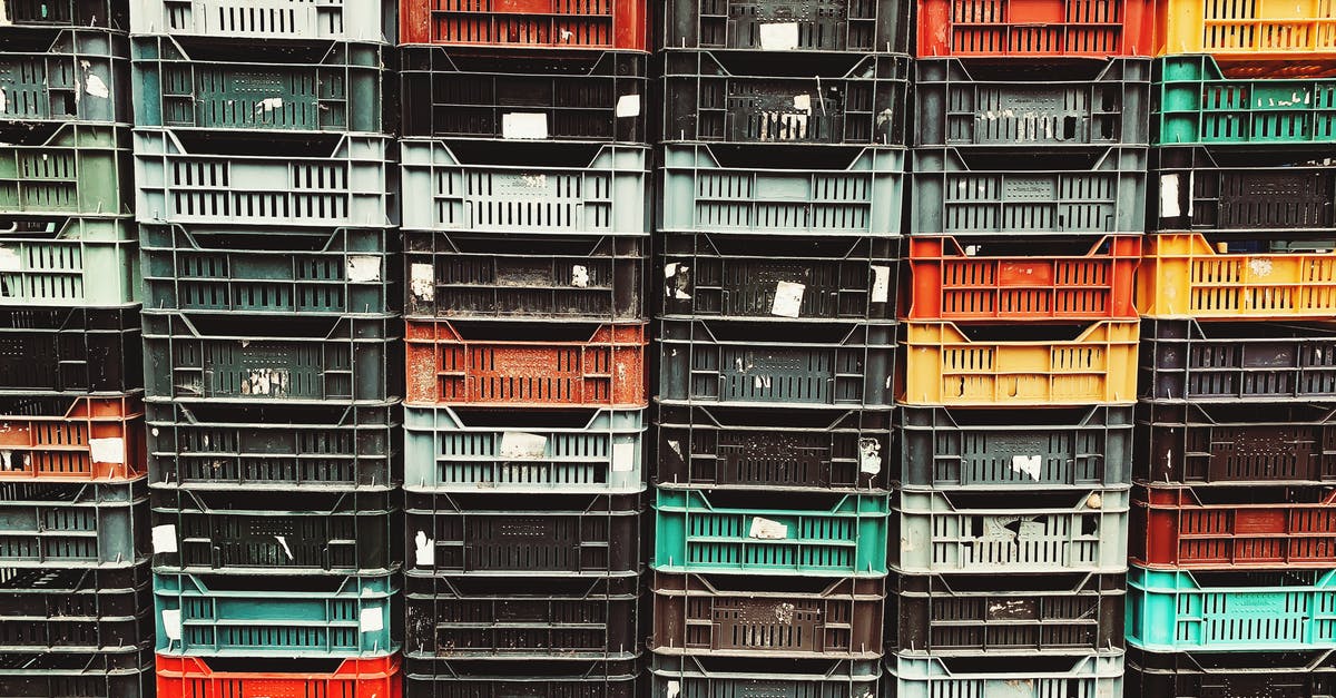 Mold in storage - Piles of Plastic Boxes