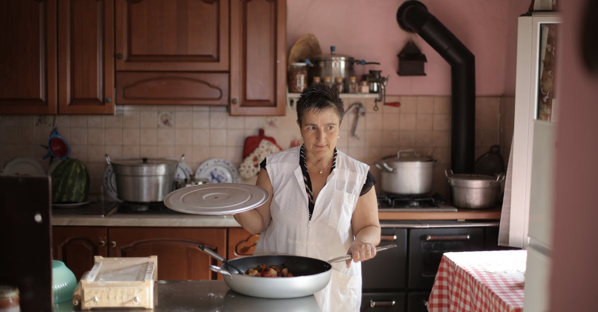 Mothballs in food cabinets [duplicate] - Lady in White Dress Holding a Frying Pan